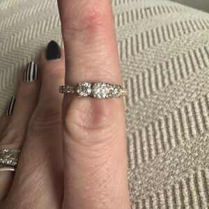 Gold Three-Stone Diamond Engagement Ring - Elegant Sparkle